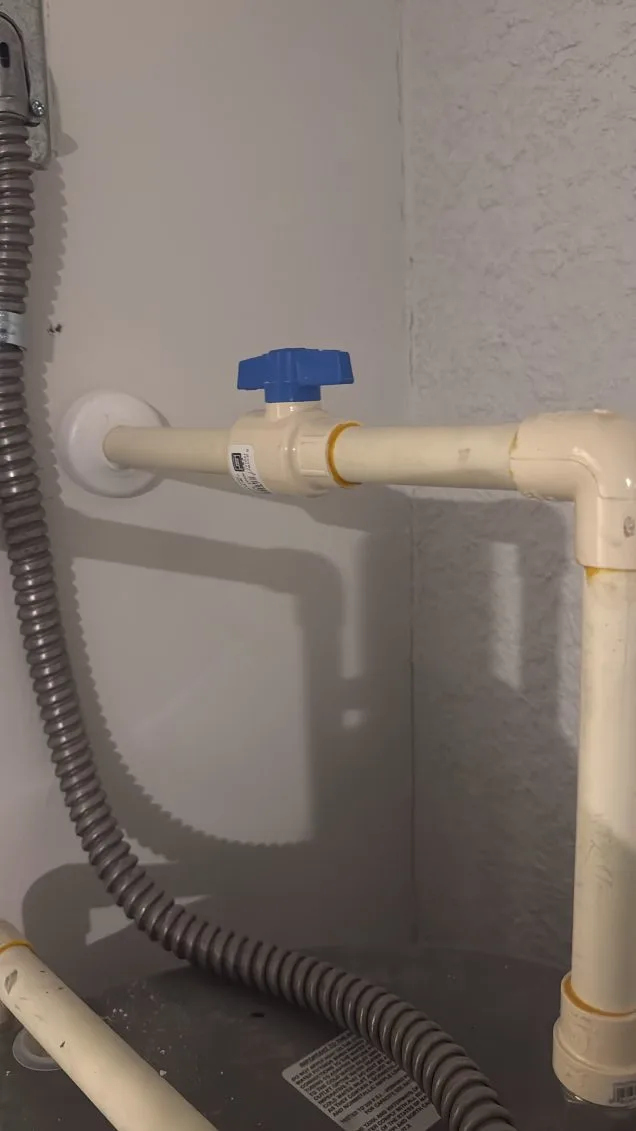 CPVC ball valve shut-off installed on a water heater supply line